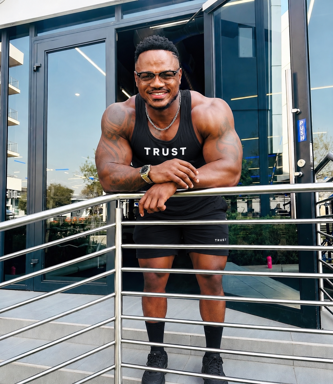 Themba Collin Mlombo wearing black TRUST training apparel